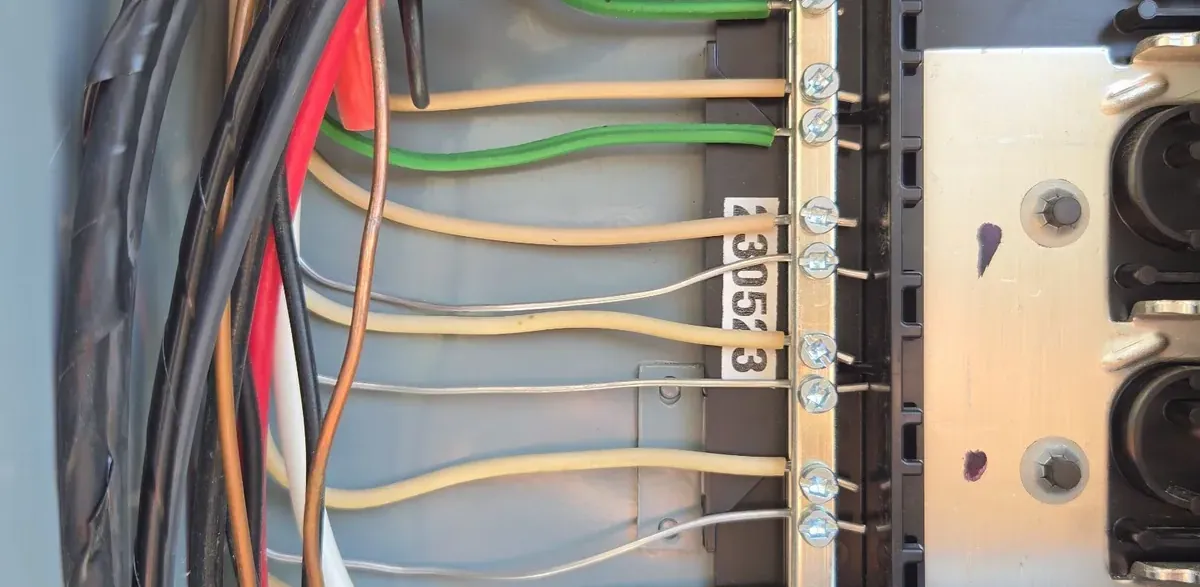 Aluminum branch circuit wires landed on the neutral bar of a Sacramento electrical panel