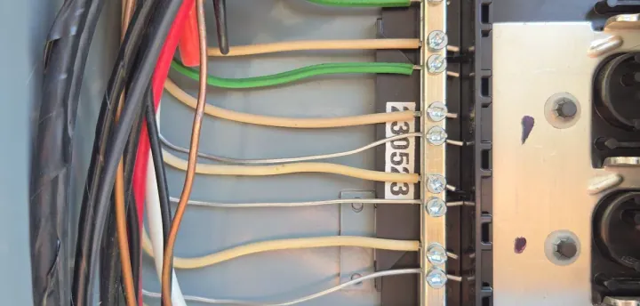 Aluminum branch circuit wires landed on the neutral bar of a Sacramento electrical panel