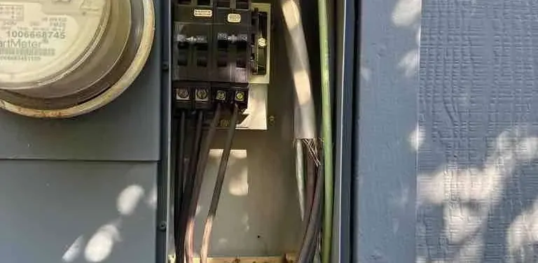 Open meter main panel during a permitted electrical inspection