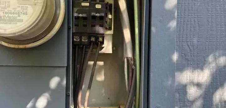 Open meter main panel during a permitted electrical inspection