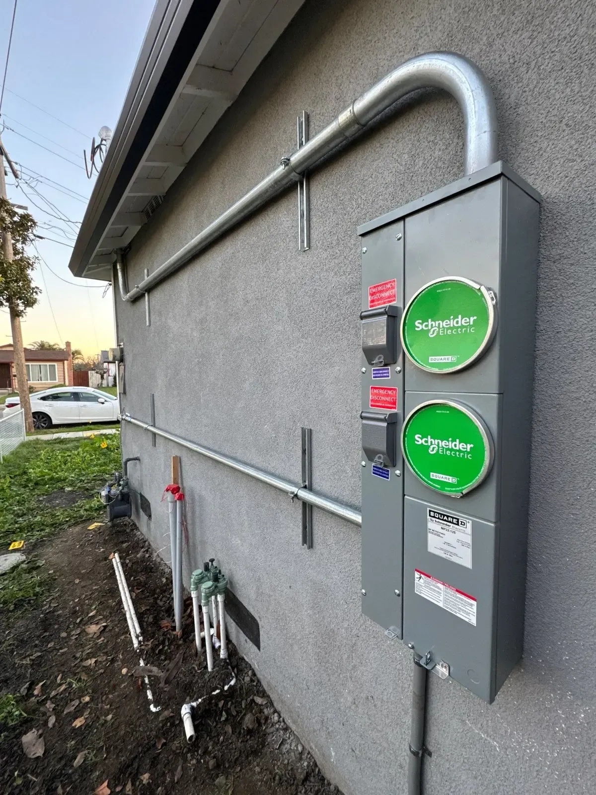 200-amp duplex meter main with two Schneider Electric meter sockets installed on a Sacramento home for an ADU