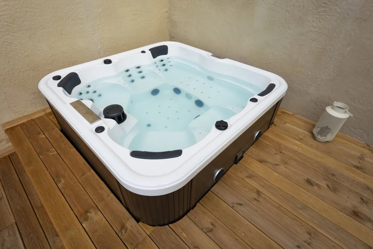 Hot tub prepared for safe electrical disconnection and removal